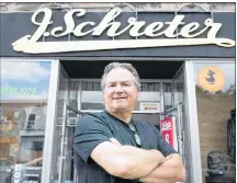  ?? CP PHOTO ?? Steve Schreter poses outside his clothing store in Montreal on Sept. 12.