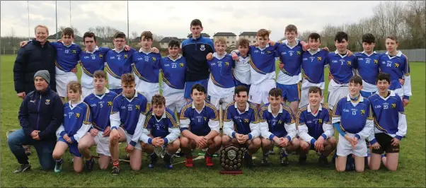  ??  ?? The Coláiste Bhrde Carnew under-16 hurling team with mentors Kevin Morris and Pat Nolan after their victory in Carlow.
