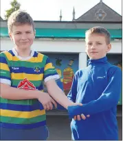  ?? (Photo: Katie Glavin) ?? Bishop Murphy Memorial School pupils Evan and Dawid, practising their Irish dancing skills at the ceilí for ‘Lá Buí agus Gorm’.