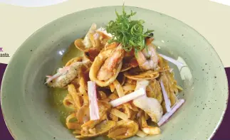  ??  ?? MUST-TRY.
Seafood pasta.