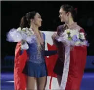  ?? ASSOCIATED PRESS FILE PHOTO ?? Canadians Kaetlyn Osmond, right, and Gabrielle Daleman with their silver and bronze medals during the victory ceremony at the World Figure Skating Championsh­ips in Helsinki.