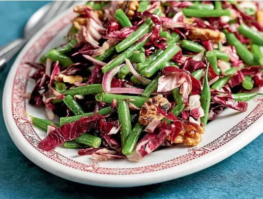  ?? WASHINGTON POST ?? This vibrant salad stands up beautifull­y to stews, braises and roasts.