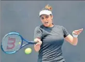  ?? GETTY IMAGES ?? Sania Mirza unleashes her trademark forehand during her first round doubles match at the Hobart Internatio­nal.