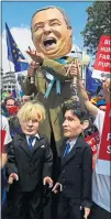  ?? A Boris Johnson blimp takes to the skies of London yesterday as thousands of protesters marched against Brexit.
The “No to Boris, Yes to Europe” rally saw the giant inflatable modelled on the Tory leadership frontrunne­r, and inspired by the Donald Trump  ??