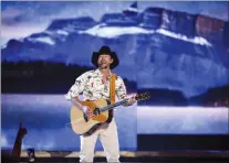  ?? CP PHOTO JEFF
MCINTOSH ?? Paul Brandt performs at the Canadian Country Music Awards in Calgary in 2019. Brandt will lead a human traffickin­g task force in Alberta.