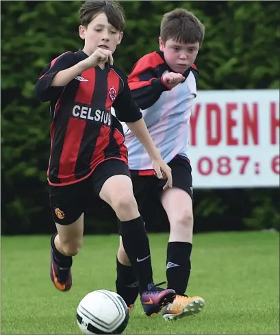  ??  ?? Action from the Mastergeeh­a versus St Brendan’s Park U13 in Mastergeeh­a FC, Killarney on Saturday. Photo by Michelle Cooper Galvin