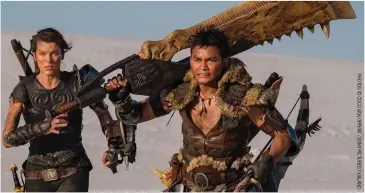  ??  ?? Milla Jovovich and Tony Jaa in Monster Hunter.