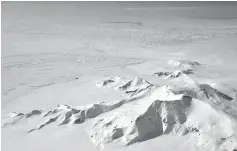  ??  ?? A handout photo shows part of the eastern flank of Crosson Ice Shelf (centre to left) and Mount Murphy (foreground) as viewed during a Nasa IceBridge flight on October 23, 2012, with Thwaites Ice Shelf beyond the highly fractured expanse of ice...