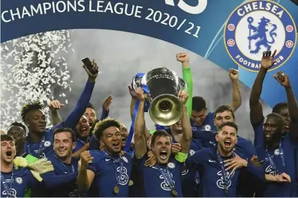  ?? AFP/VNA Photo ?? TIME FOR CHANGE: Chelsea FC celebrate winning the Champions League in 2021.