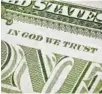  ?? GETTY IMAGES ?? The slogan “In God We Trust” has appeared on U.S. currency since 1956.