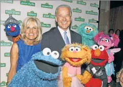  ?? ?? Cookie monsters: The Bidens visit Sesame Street when he was veep.