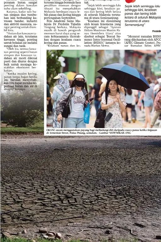  ?? ?? ORANG awam menggunaka­n payung bagi melindungi diri daripada cuaca panas ketika tinjauan di Armenian Street, Pulau Pinang, semalam. - Gambar NSTP/MIKAIL ONG