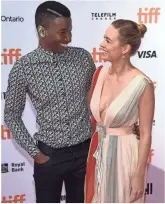  ?? EVAN AGOSTINI, INVISION/AP ?? Mamoudou Athie and Larson attend the premiere for the film, her first directing gig.