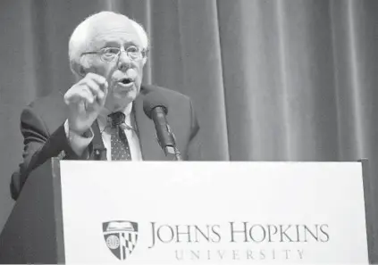  ?? KARL MERTON FERRON/BALTIMORE SUN ?? Vermont Sen. Bernie Sanders addresses his audience Thursday night at the Johns Hopkins University’s Shriver Hall.