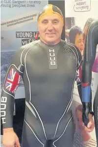  ??  ?? ●●Manchester airport firefighte­r Simon Connolly, from Royton, is to swim the length of Loch Lomond for cancer charity CLIC Sargent.