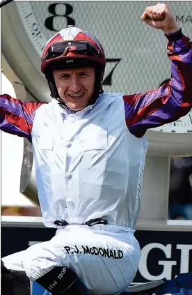  ??  ?? VICTORY: PJ McDonald celebrates winning the French Oaks in Chantilly