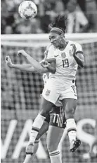  ?? ALESSANDRA TARANTINO/AP ?? U.S. defender Crystal Dunn heads the ball away from Sweden’s Stina Blacksteni­us during a group-play match Thursday.