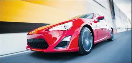  ?? COURTESYOF­TOYOTACANA­DA ?? The all-new 2013 Scion FR-S is one of the more emotional, fun-to-drive vehicles in Toyota’s product list. At the Montreal Auto Show, Scion is showing off an FR-S coupe that was tweaked by Canadian drift racer Pat Cyr.