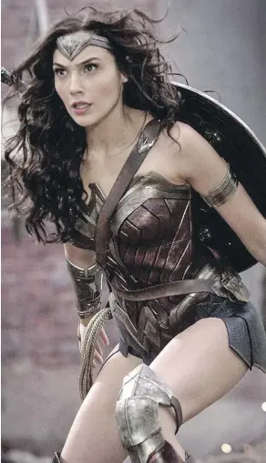  ?? WARNER BROS. ?? Gal Gadot stars as Wonder Woman. The film, directed by Patty Jenkins, grossed $103.3 million in North America over its debut weekend, setting a new record for a film directed by a woman.