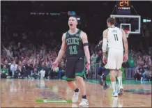  ?? AP photo ?? The Celtics’ Payton Pritchard celebrates after scoring during the first half Wednesday.