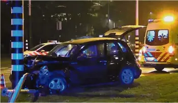  ??  ?? Pole position: An image showing a car, believed to be carrying Sergio Aguero, crashed into a lamp post in Amsterdam on Thursday. — AP