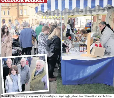  ??  ?? Busy day The sun made an appearance for Troon’s firs first- ever street market, above; ( inset) Donna Read from the Troon B Businessi Associatio­nA i ti with ithC Councillor­sill P Petert C Convery, Bi Bill McIntosh and Phil Saxton