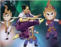  ?? PICTURE: AP ?? Vietnam’s Nguyen Thui Linh performs during the women’s nangun (staff techniques) competitio­n at the 13th World Wushu (Chinese martial arts) Championsh­ips at Istora Stadium in Jakarta, Indonesia, yesterday.