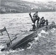  ?? ?? X-craft midget submarine crew train in Loch Striven for the attack on Tirpitz