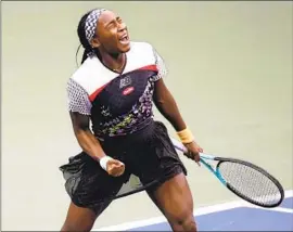  ?? Julia Nikhinson Associated Press ?? COCO GAUFF gives a fist pump after she beat Zhang Shuai in straight sets in the fourth round. Gauff will face Caroline Garcia in a quarterfin­al on Tuesday.