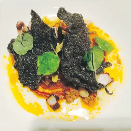  ?? — PHOTOS: MIA STAINSBY ?? Chef’s Table grilled octopus, squid-ink puff.