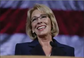  ?? TED S. WARREN — THE ASSOCIATED PRESS FILE ?? U.S. Education Secretary Betsy DeVos speaks during a dinner hosted by the Washington Policy Center in Bellevue, Wash. The Associated Press has learned the Education Department is considerin­g only partially forgiving federal loans for students defrauded...