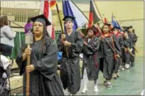 ?? PHOTO PROVIDED BY VINCENT GIORDANO ?? Graduates of the program walk into their ceremony at HVCC.