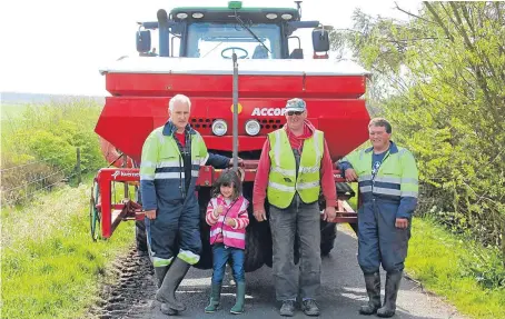  ??  ?? Peter Robertson with daughter Georgina, foreman Graham Milne and tractorman Martin Turriff.