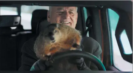  ?? JEEP VIA THE ASSOCIATED PRESS ?? This undated image provided by Jeep shows Bill Murray reprises his role as Phil Connors from the 1993 film “Groundhog Day,” in a scene from the company’s 2020 Super Bowl NFL football spot.