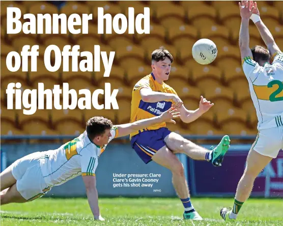  ?? INPHO ?? Under pressure: Clare Clare’s Gavin Cooney gets his shot away