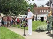  ?? NICHOLAS BUONANNO — NBUONANNO@TROYRECORD.COM ?? Judd Krier, commanding officer of the Naval Nuclear Power Training Unit in Ballston Spa, speaks as the Grand Marshal after Ballston Spa’s Memorial Day parade Saturday morning.