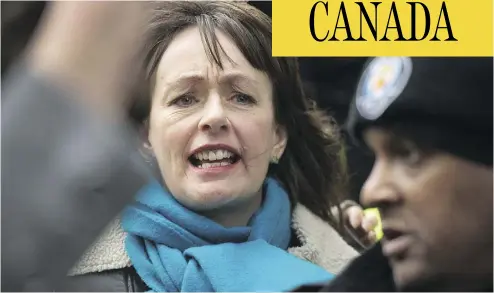  ?? PETER J. THOMPSON / NATIONAL POST ?? Lucy DeCoutere leaves Toronto’s Old City Hall Courthouse after appearing at Jian Ghomeshi’s trial in March 2016.