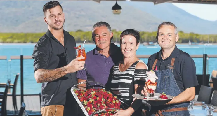  ?? Picture: STEWART McLEAN ?? SAFE: Dundee’s bar manager Jacob Low with a strawberry cocktail, owner Gary Low, director Tina Wort and head chef James Wort with a Strawberry Delight dessert.