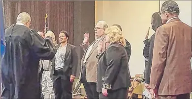  ?? | CARRIE NAPOLEON/OR SUN-TIMES MEDIA ?? Judge George Paras swears in Lake County officials Tuesday.