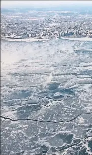  ?? Picture ?? Chicago seen from the skies as Lake Michigan turns to ice last weekJim Funk/ Cover Images