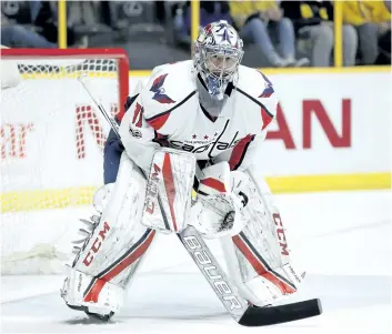  ?? MARK HUMPHREY/THE ASSOCIATED PRESS ?? Washington Capitals goalie Philipp Grubauer gets the start against the Nashville Predators during a game in Nashville back in February 2017. When the Carolina Hurricanes took the risk of trading a third-round pick to Chicago for the rights to Scott...