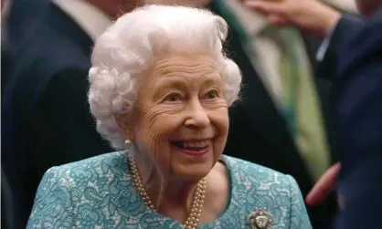  ?? Photograph: Getty Images ?? Queen Elizabeth II welcoming guests at a Windsor Castle reception on Tuesday.