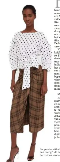  ?? © rr ?? De geruite wikkelrok van Zara lijkt op een ‘loengi’, de sarong die mensen in het zuiden van India dragen.