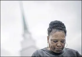  ?? BRANDEN CAMP / ASSOCIATED PRESS ?? Aretha Allen, who lost her niece and her niece’s brother in a tornado that hit Sunshine Acres mobile home park in Adel, reacts Monday during an interview outside First Baptist Church Adel.