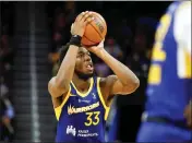  ?? SHAE HAMMOND — BAY AREA NEWS GROUP FILE ?? James Wiseman will be eligible for an extension following next season, but he's played less than a half-season of games for the Warriors over his first two years and struggled to adjust to the speed of the NBA game and the Warriors' read-and-react offense.