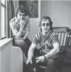  ?? DAVID GAHR/GETTY IMAGES ?? Lyricist Bernie Taupin, left, and singer-songwriter Elton John pose for a portrait in November 1970 in New York City.