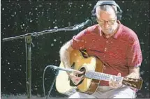  ?? Dave Kaplan ?? ERIC CLAPTON balances blues with pop on “Happy Xmas.”