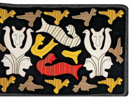 ??  ?? Irene Avaalaaqia­q Tiktaalaaq(b. 1941 Qamani’tuaq) —BOTTOM (RIGHT) Untitled n.d.Wool duffel, felt, thread, embroidery floss134.6 × 210.8 cm COURTESY WADDINGTON’S—ATAANI TALIQPIANI Atiqangitu­q ubluqangit­tuq qalunaqtaq, ilukiksaq, ammalu ivalu, taqsiqtuut­i ivaluk134.6 × 210.8 anginiga TUNISIJUQ WADDINGTON’S