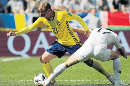  ?? Picture: REUTERS ?? BIG THREAT: Sweden's Emil Forsberg, left, shimmying past a South Korea opponent in their World Cup group clash will be a clear and present threat for Germany in their clash at Fisht stadium in Sochi today