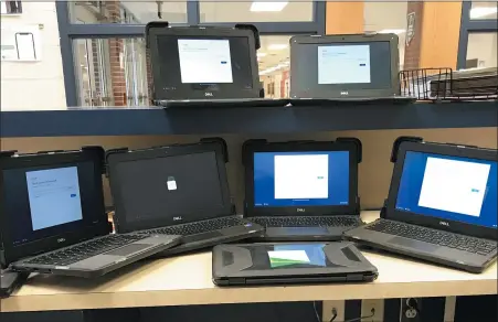  ?? PHOTO COURTESY OF POTTSTOWN SCHOOL DISTRICT ?? Some of the Pottstown School District’s Chromebook computers held up by grant rules which can now be distribute­d.